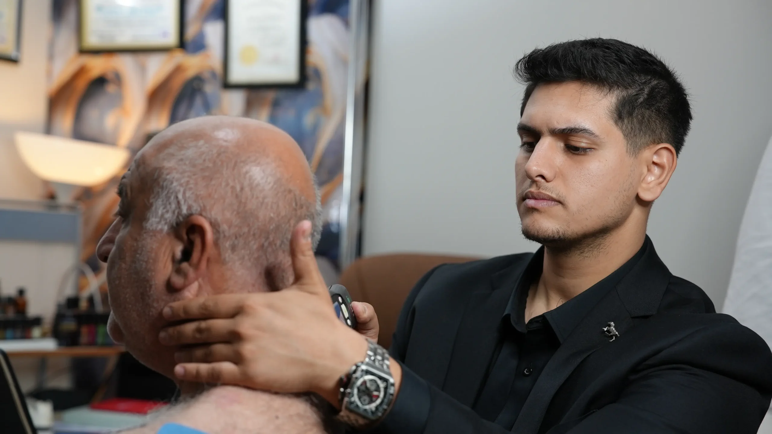 Theera Touch practitioner giving an initial consultation to a new patient