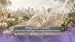 Allergy Season in Sydney: How NAET Therapy Can Help Before It Starts — spring blossoms and a glass sphere holding botanical specimens, with pollen drifting in front of the Sydney skyline